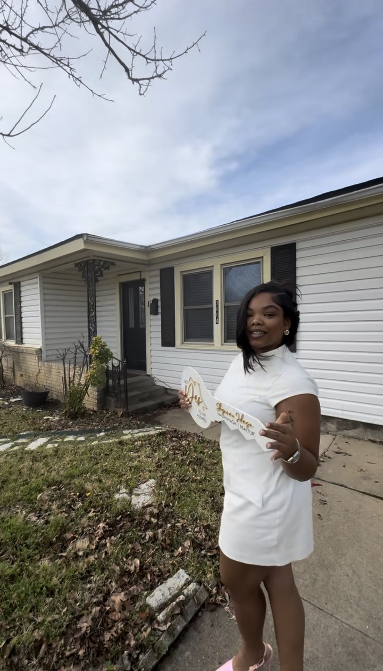 Family in front of new townhome